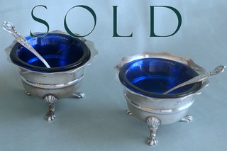 PAIR OF FOOTED MASTER SALTS AND THEIR MATCHING SPOONS