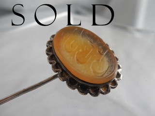 A MERCHANT'S SEAL STONE calligraphic intaglio-carved Carnelian in Silver Stickpin