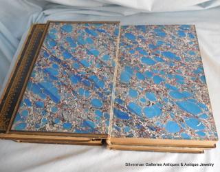 blue marbled end papers, matching in all four volumes