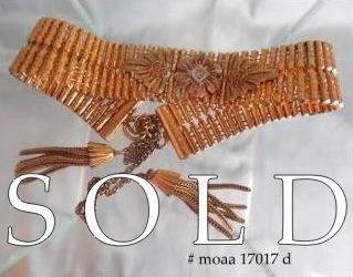 ‘TASSELS’ BRACELET, supple vertical links and graceful adjustable 'chain & tassels' lock