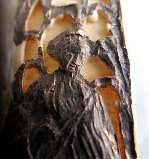 Guards are sculpturally carved in relief and open work, and silvered