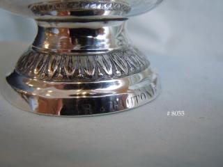 Detail of the "Egg & Dart" border above the engraved names on foot collar
