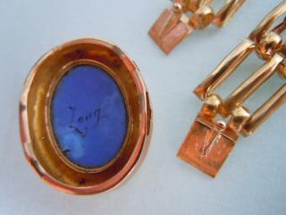 Each end of the bracelet length (or half necklace) has good hand-made 18k gold 'tongue' latch