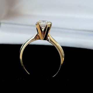 MODERN ROUND BRILLIANT .55 CARAT Diamond Solitaire