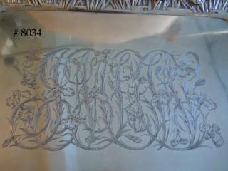 Central Monogram Cypher intertwined with Irises