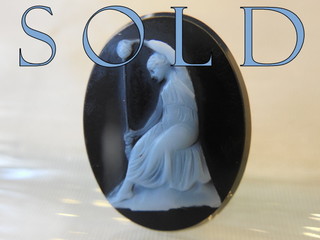 ATHENA SPINNING, or possibly her rival, ARACHNE