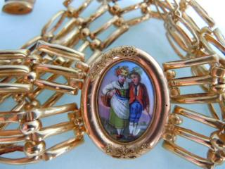 Painted enamel center ornament , boy and girl in traditional dress of the Swiss Canton Zug (in French, Zoug)