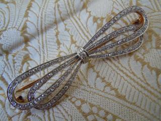 Each diamond is vintage full-cut, 58 facet, well-matched, fine clarity and color