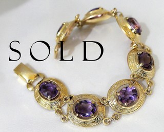 SEVEN OVAL FACETED AMETHYSTS BRACELET