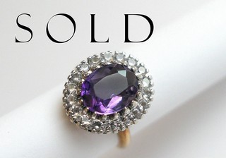 OVAL AMETHYST in halo of White Sapphire brilliants