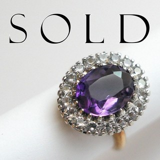 OVAL AMETHYST in halo of White Sapphire brilliants