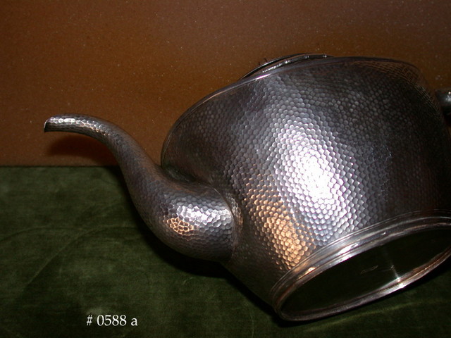 hand-hammered surface, oval base