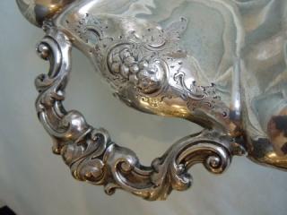 repousse with stippled florals and leafage