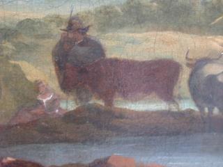 Another detail of couple minding cattle