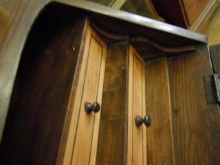 Detail of Blonde Drawer Fronts with Ebony String Inlays and Contrasting Wood Knobs