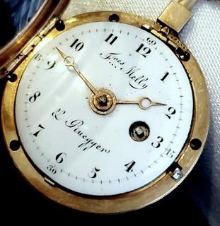 James Melby / E.M. Ruegger 18k diminutive keywind/keyset watch with wonderful original high dome glass crystal