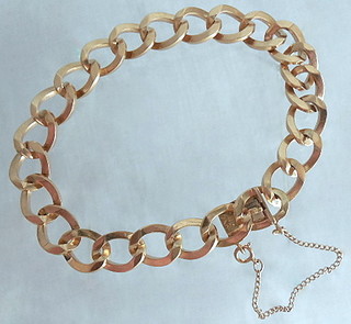 FLEXIBLE CURB LINKS 18k gold bracelet of angular curb links, in the manner of Verdura