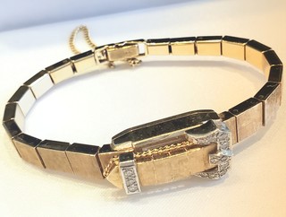 "DIAMONDS BUCKLE" 14K gold bracelet / watch with hinged cover