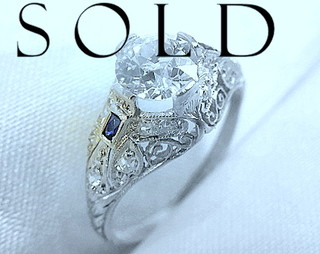 1.20 cts (center .98) Edwardian 15 diamonds & blue sapphires in Platinum