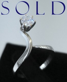 Sleek & Graceful Modernist .65 carat Diamond Solitaire ring