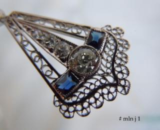 True filigree, very rare in platinum, is openwork composed of coiled twisted wire