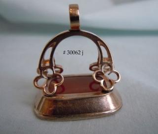 Gold fob pendant with four clover quatrefoils